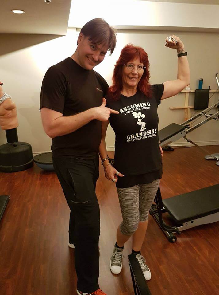 Why Hire a Personal Trainer? Find out! Troy with his client.