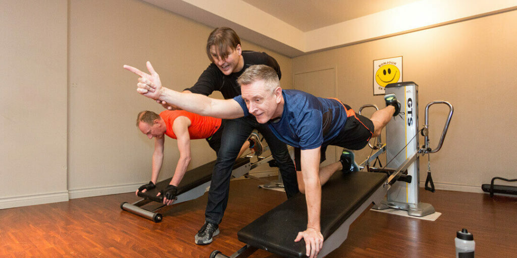 How to Find and Attend the Best Fitness Studios in Vancouver. Troy with his clients.