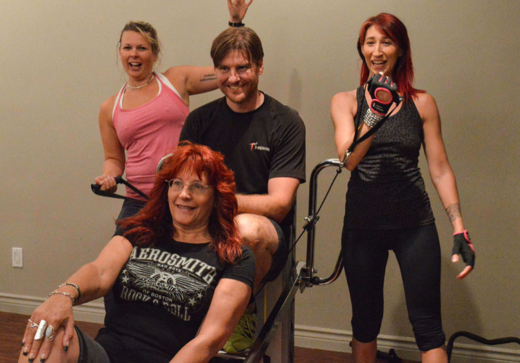 Life-changing Benefits of Group Fitness Classes Vancouver. Picture of Troy and happy clients.